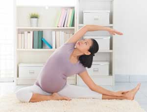 Pregnant woman stretching